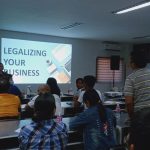 Negosyo Center Business Counselor discussing DTI programs and services.