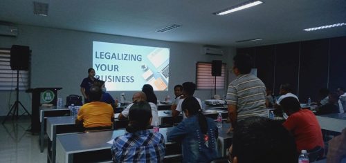 Negosyo Center Business Counselor discussing DTI programs and services.