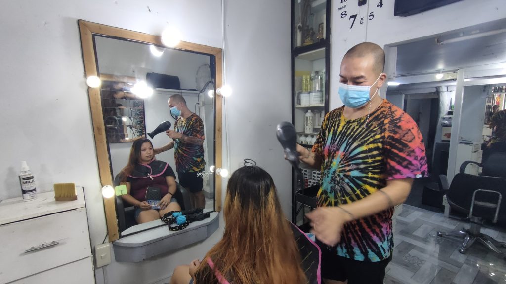 In Photo: Hair Stylist from Asher Salon and his client