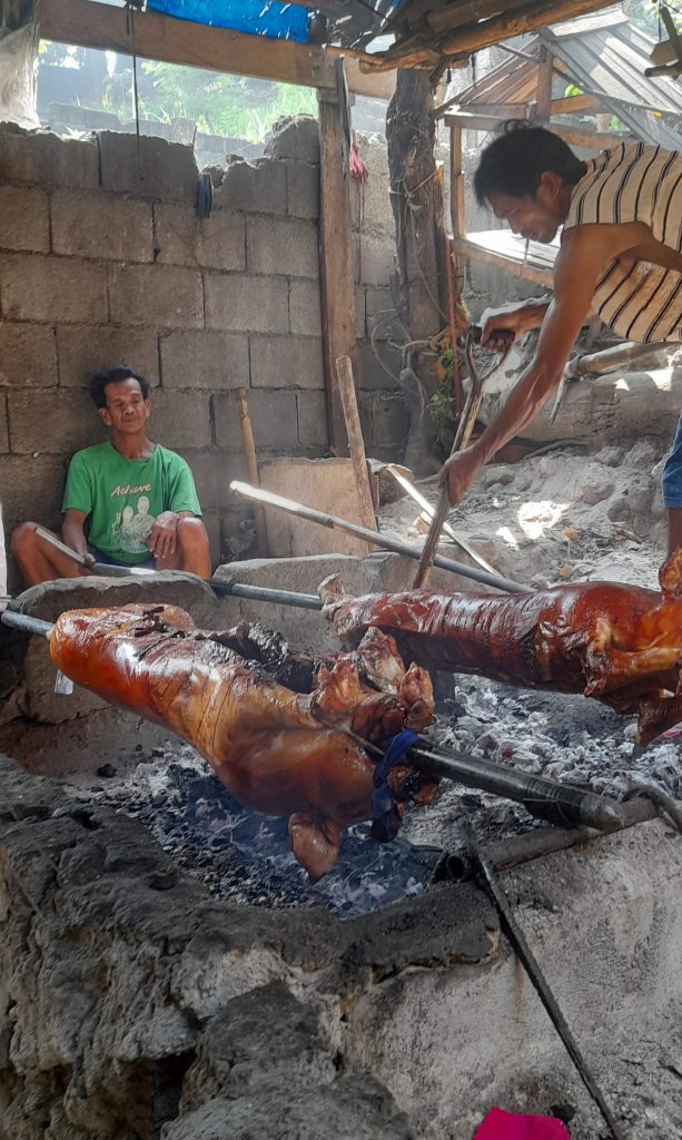 Aboy Annalie Lechon House, while making their famous lechon.