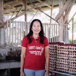 Ms. Serapia “Cherry” Cano Jimenez, together with her salted egg products.
