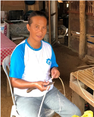 A member of SPAHFMA working on a new nito handicraft