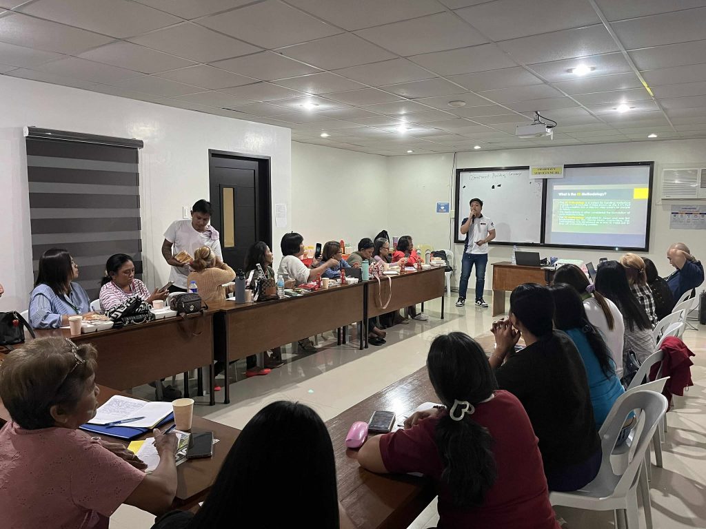 MSME participants attentively listening during the seminar on business licensing and 5S good housekeeping.