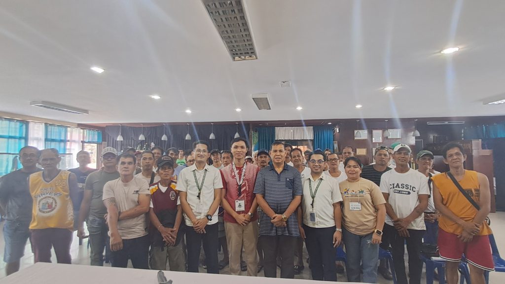 DTI Laguna, OVP, and LGU Paete officials and community members participate in the Mag Negosyo Ta ‘Day orientation meeting held in Paete, Laguna, showcasing discussions, presentations, and engagement with aspiring micro-entrepreneurs.