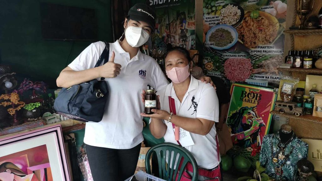 Agnes Bicomong, together with NC Business Counselor Arianne Rose C. Alinios, presenting her product.