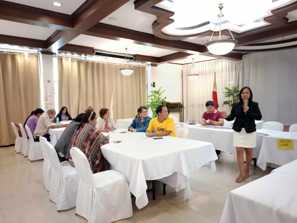 DTI-Laguna conducts BEST Game training for CFIDP coconut farmers in Los Baños, Laguna, enhancing financial literacy and promoting sustainable entrepreneurship through simulation-based learning and cooperative development.
