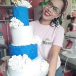 in photo: Ms. Hazel Christine Salmasan holding her cake product.