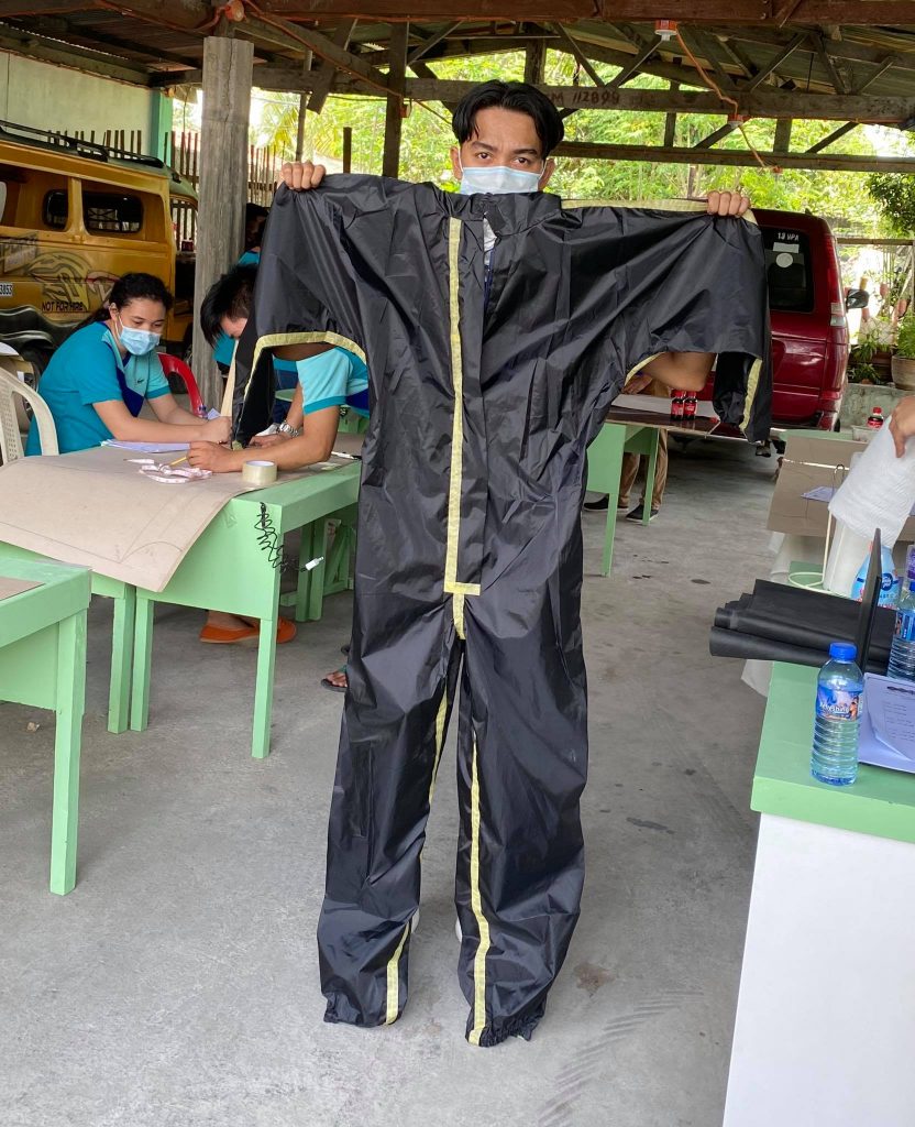 A training participant shows his work in progress
