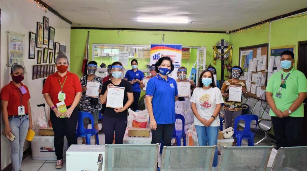 Group photo of DTI staff with the beneficiaries