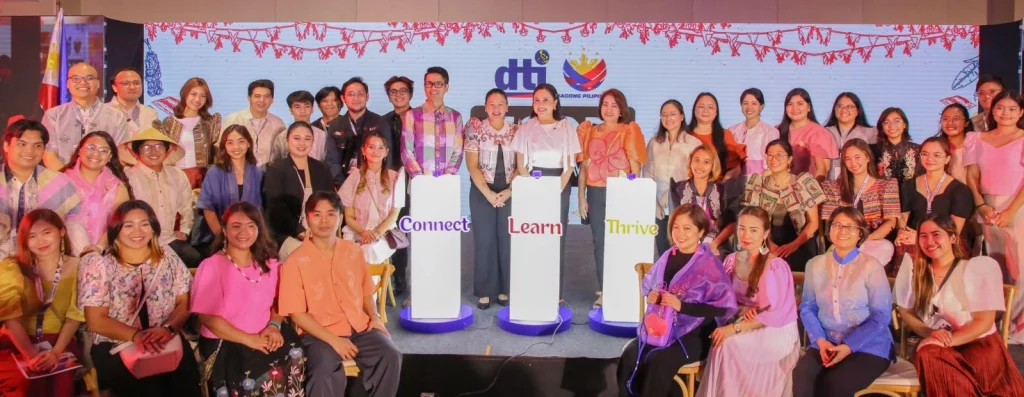 The DTI Creative Industries Development Office (CIDO), together with (center, L–R) Bureau of Competitiveness and Development (BCD) Assistant Director Jo-Dann N. Darong, Competitiveness and Innovation Group (CIG) Supervising Head and Assistant Secretary Nylah Rizza D. Bautista, DTI Secretary Ma. Cristina A. Roque, and BCD Director and CIDO Officer-in-Charge Lilian G. Salonga, pose for a photo during the launch of the Malikhaing Pinoy Website, which highlights its three main features: Connect, Learn, and Thrive.