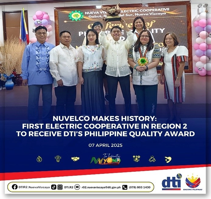 NUVELCO officials and DTI representatives pose during the Philippine Quality Award conferment ceremony in Dupax del Sur, Nueva Vizcaya.