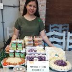 in photo: Ms. Myrna, owner of MYWILL's Food Products.