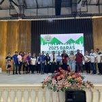 Group photo taken at the 2025 Baras Business Summit on a decorated stage.