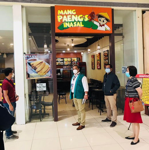 DTI, DOLE, and DOT monitoring a restaurant in Region 9