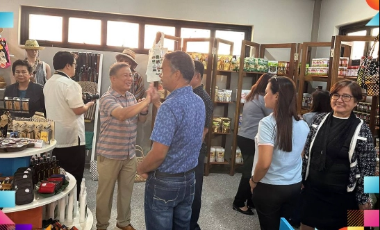 Visitors and officials browsing locally made MSME products inside the newly opened OTOP Store Cagayan at Gasat Hall, showcasing a vibrant retail space filled with handcrafted goods and regional delicacies.
