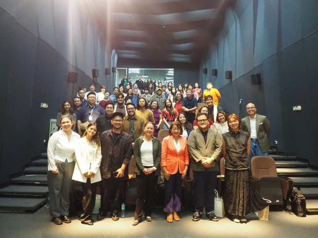 DTI, De La Salle-College of Saint Benilde, CSB, Malikhaing Pinoy Chats, Creative Campuses, Creative Industries, Creative Placemaking, Higher Education, Academe-Industry Collaboration, Philippine Creative Industries Development Act, DTI-CIDO, Innovation, Creative Ecosystem, Manila, Philippines, Nylah Rizza D. Bautista, Lilian G. Salonga, British Council Philippines, CHED, PTTC, TESDA, Benilde HiFi

Alt Text for the Image:

Group photo of participants and speakers at the "Malikhaing Pinoy Chats: Building Creative Campuses" event, taken inside an auditorium at the Benilde Design + Arts Campus. Prominently featured in the front row (center, L-R) are Andrei Nikolai Pamintuan (British Council Philippines), DTI Asec. Nylah Rizza D. Bautista, DTI-CIDO OIC Director Lilian G. Salonga, Alain Zedrick S. Camiling (Benilde), and Clarrezn A. Ramirez (Benilde).