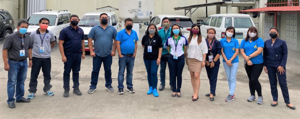 Group picture of auditors with the auditee