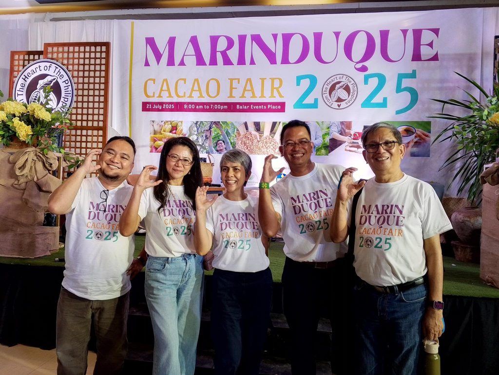 Participants and exhibitors gather at the 2nd Marinduque Cacao Fair 2025 held at Balar Events Place, showcasing local cacao products and celebrating the province’s growing cacao industry.