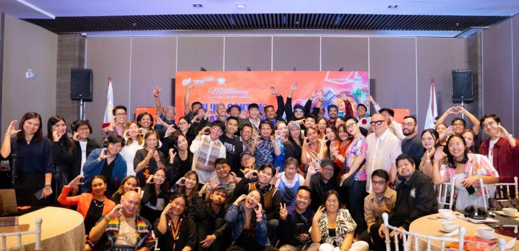 Scholars and mentors of the Malikhaing Pinoy Online Content Creation Class Batch 2 gather for a group photo during the culminating event, joined by Usec. Jose Javier Reyes, FDCP Chairperson and CEO, Usec. Paolo Villaluna, Director General of the FAP, Acting ED Lilian G. Salonga of the PCIDC Secretariat, Acting Deputy ED Jo-Dann Darong of the PCIDC Secretariat, PCIDC Secretariat staff, and guests—celebrating a successful week of learning, creativity, and collaboration in shaping the future of Filipino digital content creation.
