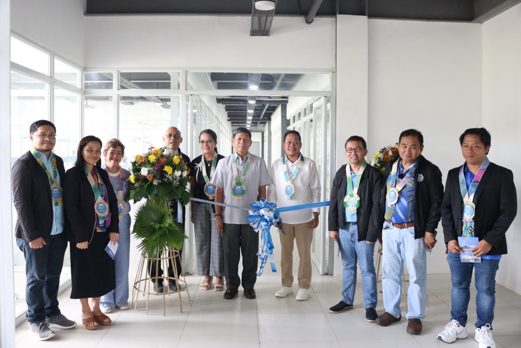 Ribbon-cutting ceremony for DTI's new packaging facility in Davao Oriental. DTI Region 11 Director Romeo L. Castañaga is in attendance.