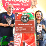 ASec Du-Naga and RD Jude with chocolate bar