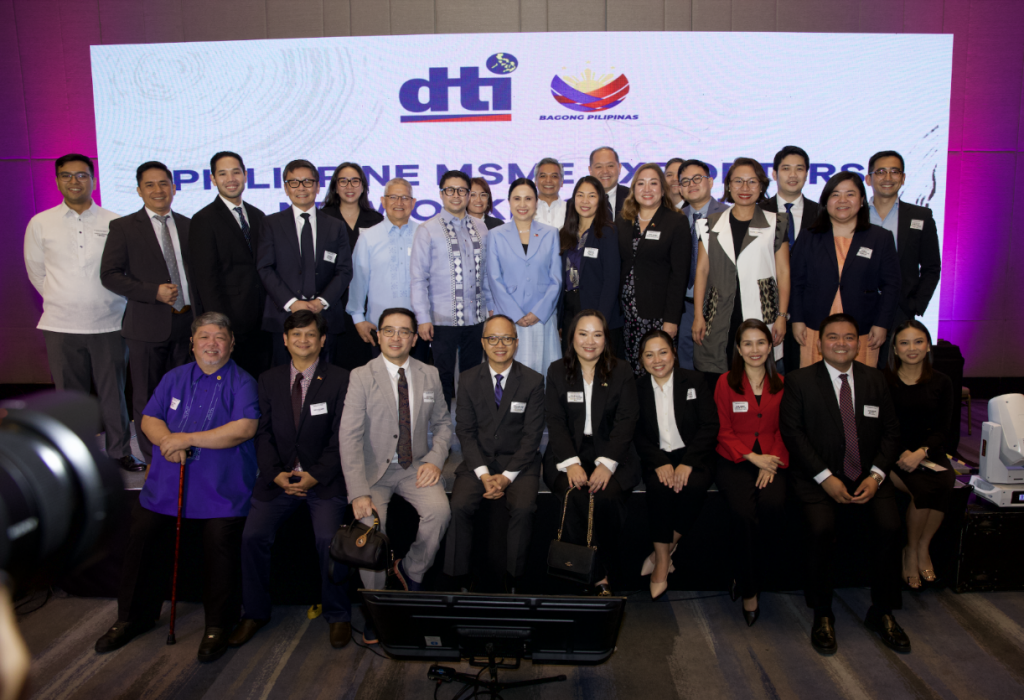 DTI Secretary Roque with FTSC & representatives at Philippine MSME Networking Night meeting.
