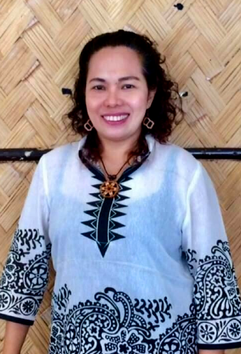 A smiling portrait of Ms. Maria Valera