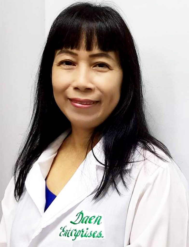 A smiling photo of Ms. Encarnacion Borja Lapinig