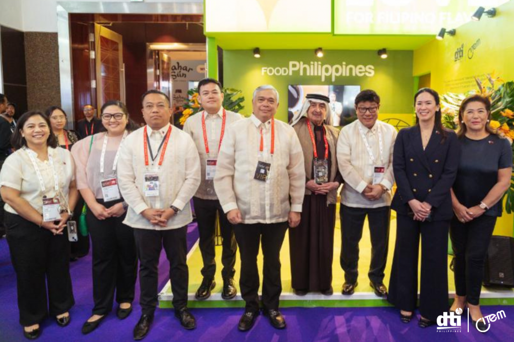A group photo taken at a 'Food Philippines' event. From left: CITEM onsite Project Manager Atty. Anna Grace Marpuri, EMB Asst. Director Maria Katrina Rivera, Consul General Marford Angeles, Trade Commissioner Vichael Angelo Roaring, Philippine Ambassador to Dubai H.E. Alfonso Ferdinand Ver, Philippine Supermarket owner Abu Nader, DA Assistant Secretary Philip Young, and from the OP, Special Envoy Anna Kathryna Pimentel and Special Envoy Karen Santos.
