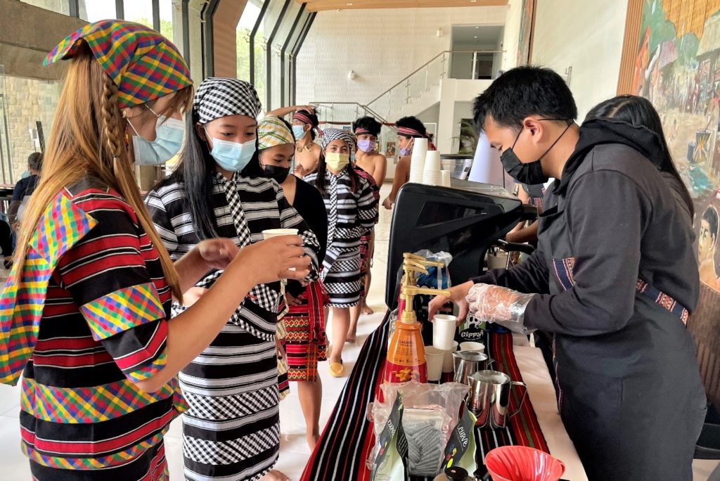 Local Baristas serving Performers