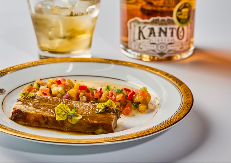 A photo of a Fil-Australian recipe and a bottle of Kanto Salted Caramel by Destileria Barako 