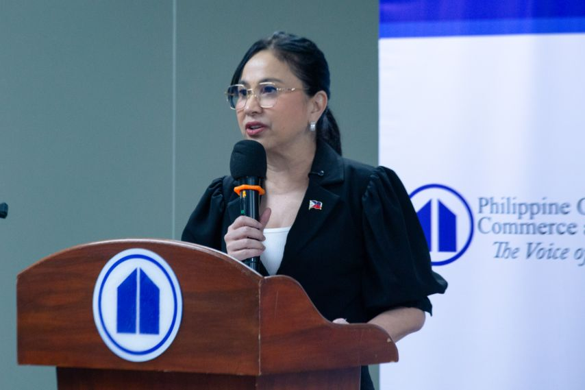 DTI Secretary Cristina Roque addressing business leaders at the 51st Philippine Business Conference & Expo Media Launch, emphasizing the urgency of digital transformation in the Philippines.