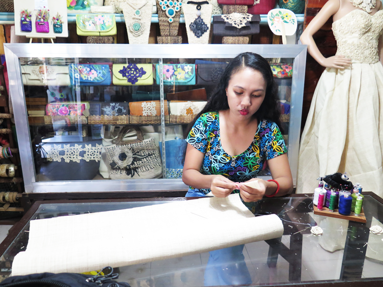 Buttons 'n Things employee working on the design of a new accessory