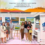 A group photo of Atty. Mabalot and some artists from the Guhit Kulay International taken at the PTIC-HK booth.