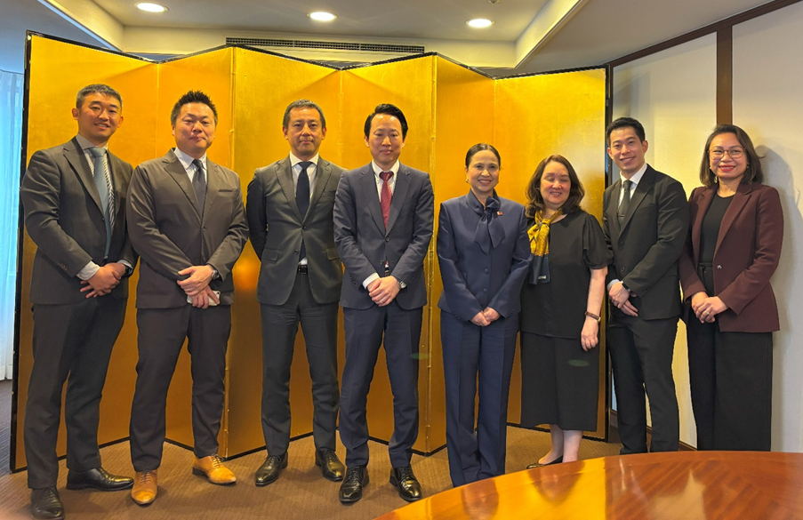 A group photo of eight individuals: four Japanese representatives and four Philippine trade officials. From left to right, they are are Mr. Yohei Kurisu, Mr. Shigeo Fukuda, Mr. Satoru Wachi, Mr. Shuichiro Ikemoto, DTI Secretary Cristina A. Roque, Special Trade Representative Dita Angara-Mathay, DTI Assistant Secretary Englebert Josef Chua, and DTI Assistant Secretary May Niña Celynne Layug. 