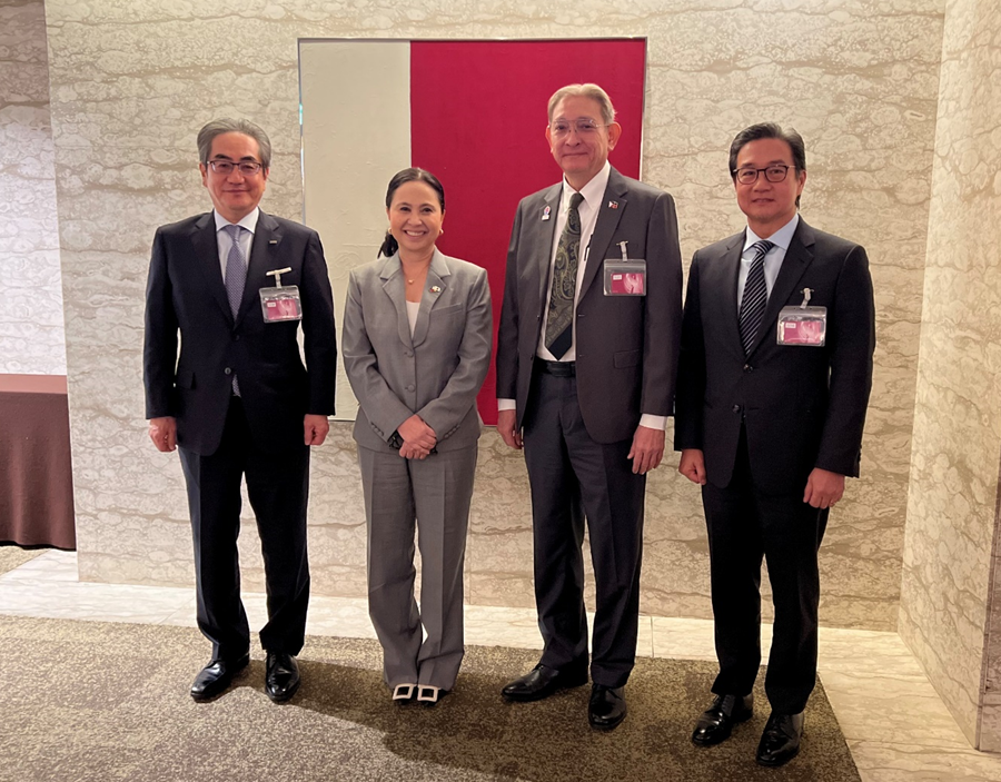 A group photograph of four individuals: Mr. Seiji Imai, Chairman of the Japan-Asia Relations Committee of Keizai Doyukai, Secretary Cristina A. Roque, PHILJEC President and CEO Richard Albert I. Osmond, and PHILJEC Chairman Alfred V. Ty. 